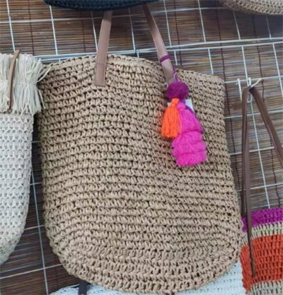 Handwoven fanm sak ak boul kolore